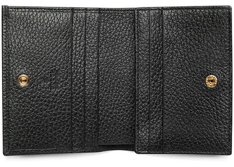 GG Marmont card case in black leather .